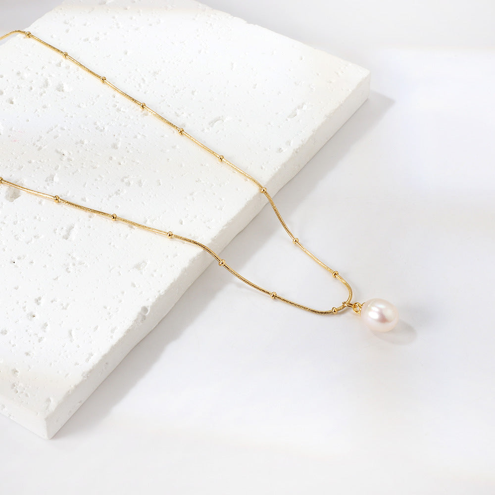Damen Halskette mit hochwertigem Perlenanhänger aus vergoldetem Edelstahl Shop Nory
