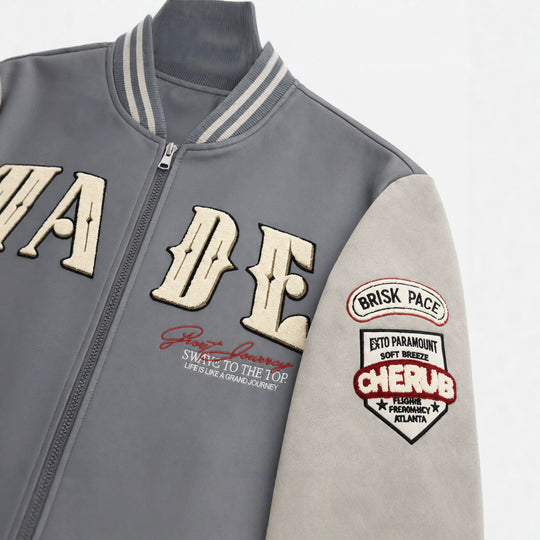 Herren Collegejacke im Letterman‑Style mit Kunstlederkörper und Veloursärmeln Shop Nory