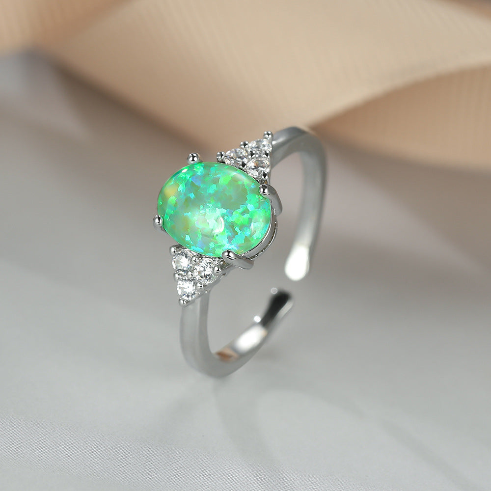 Damen Ring mit schimmerndem Opal und funkelnden Zirkonia-Details Shop Nory