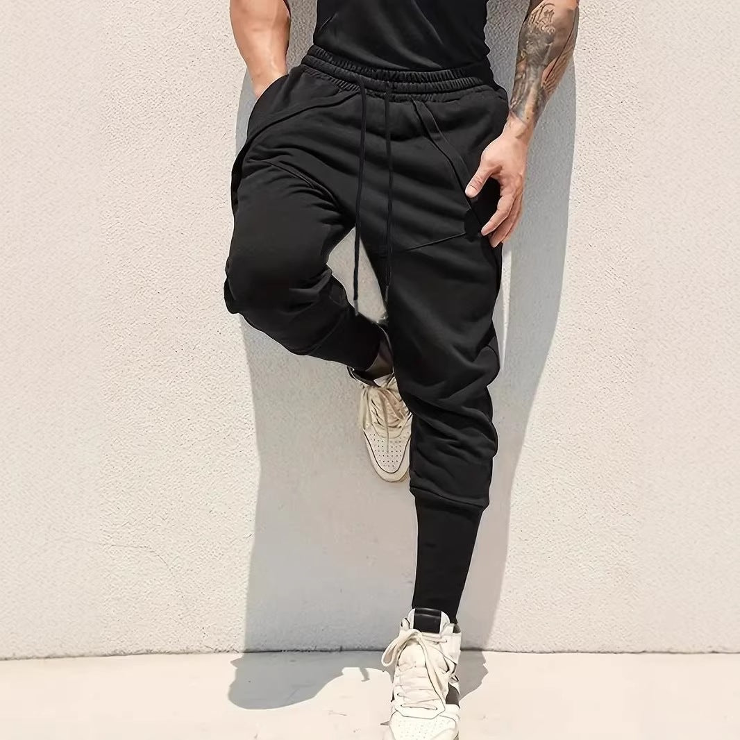Herren Tapered-Jogginghose mit tiefem Schritt, elastischem Bund & diagonalgesetzten Taschen Shop Nory