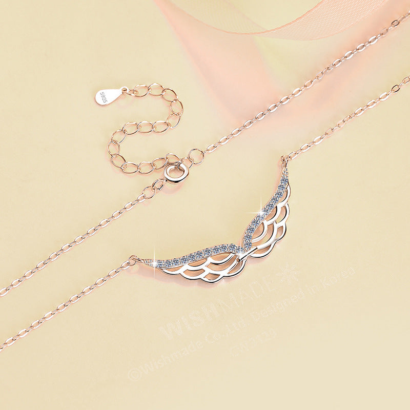 Damen Halskette mit elegantem Flügel-Design und Zirkonia-Besatz Shop Nory