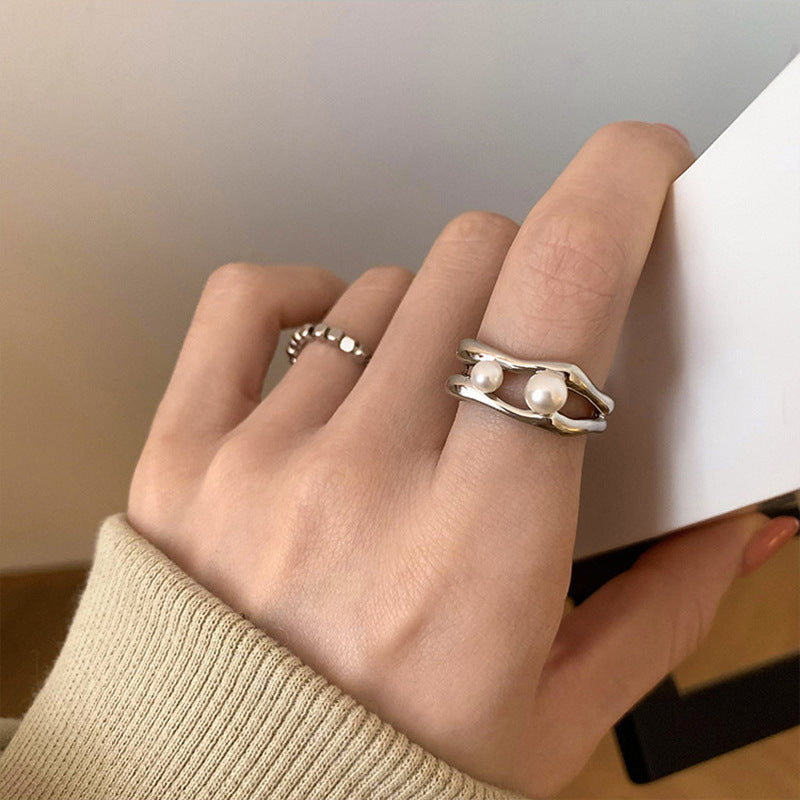 Damen Offener Ring mit filigranem Design und eleganten Perlen Shop Nory