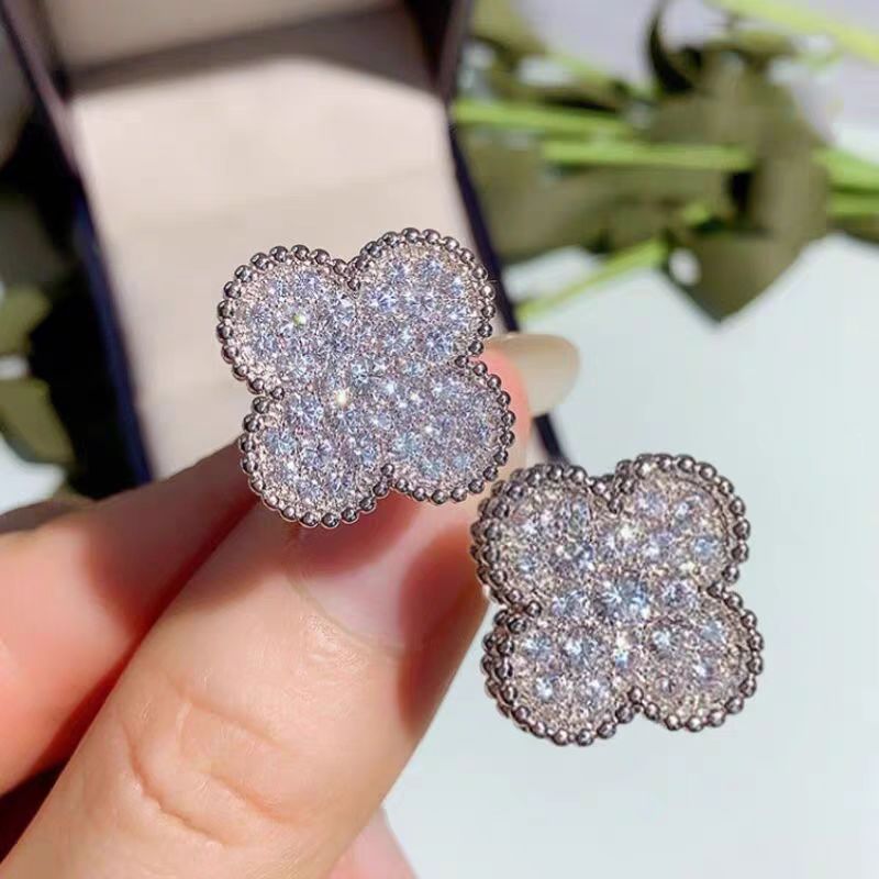 Damen Ohrringe mit funkelndem Blumen-Design Shop Nory