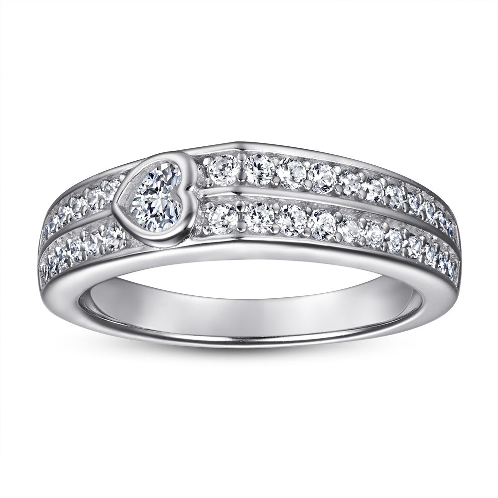 Damen Verlobungsring mit herzförmigem Hauptstein und kunstvollem Zirkonia-Besatz Shop Nory