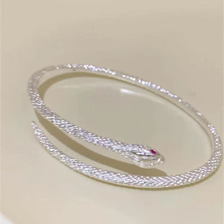 Damen Armreif mit elegantem Schlangendesign und funkelnden Zirkonia Shop Nory