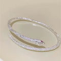 Damen Armreif mit elegantem Schlangendesign und funkelnden Zirkonia Shop Nory