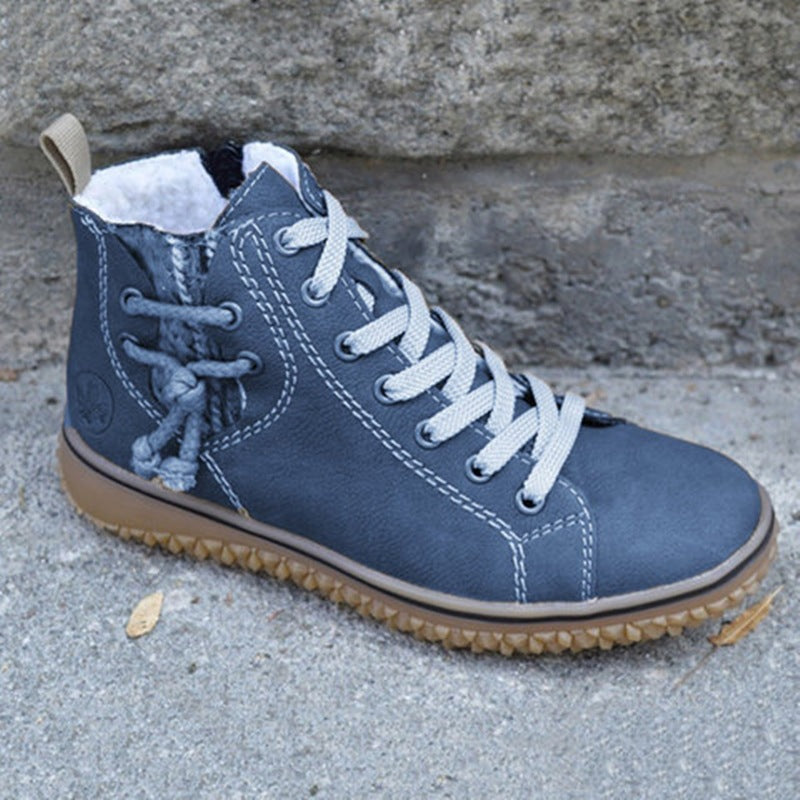Damen High-Top Sneaker-Boot mit seitlichem Reißverschluss, dekorativem Knöchelriemen und profilierter Gummisohle Shop Nory