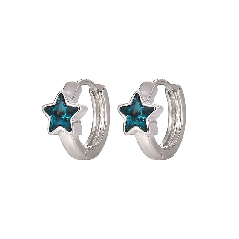 Damen Ring mit funkelndem blauen Sternanhänger und filigranen Details Shop Nory