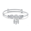 Damenarmband mit kunstvollen Perlen und zarten Federmotiven Shop Nory