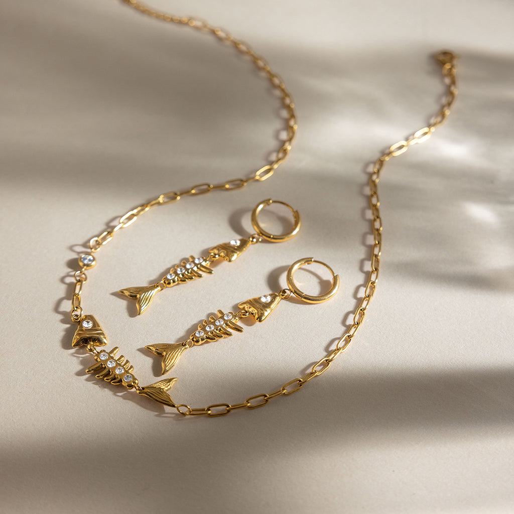 Damen Ohrhänger im eleganten Fisch-Knochen-Design mit Kristallakzenten Shop Nory