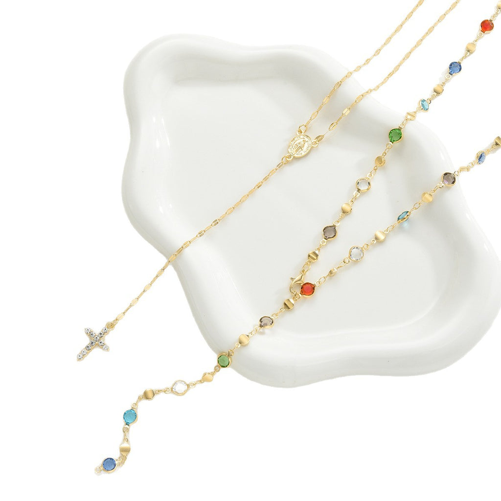 Damen-Halskette mit bunten Anhängern und elegantem Kreuzdetail Shop Nory