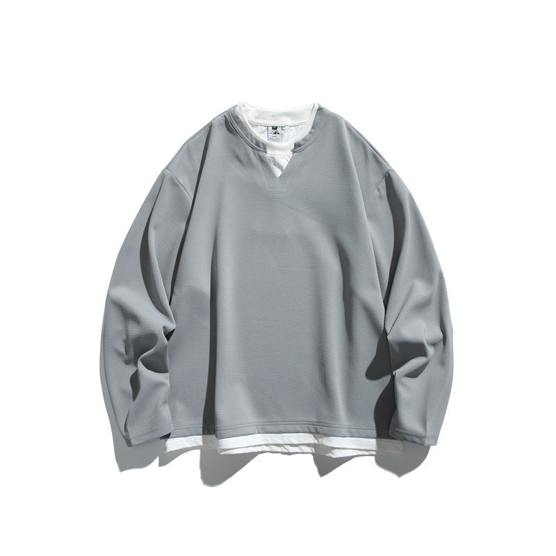 Unisex Oversize-Sweatshirt mit V‑Notch und integriertem Layer‑Look Shop Nory