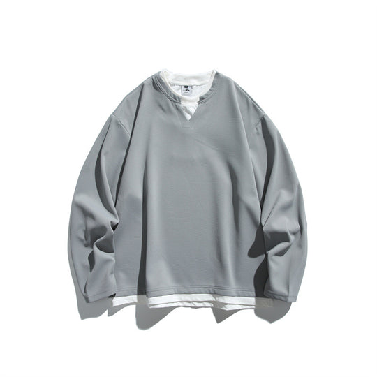 Unisex Oversize-Sweatshirt mit V‑Notch und integriertem Layer‑Look Shop Nory