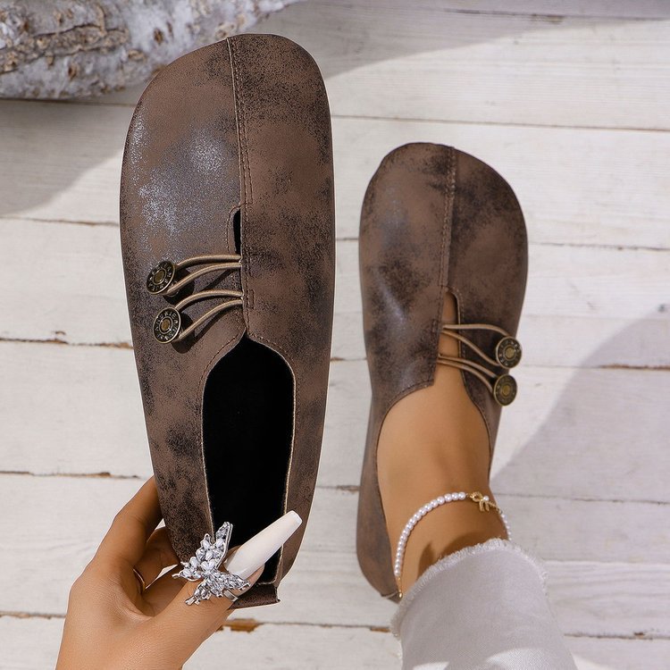 Damen komfortable Slipper mit modischen Knopfdetails
