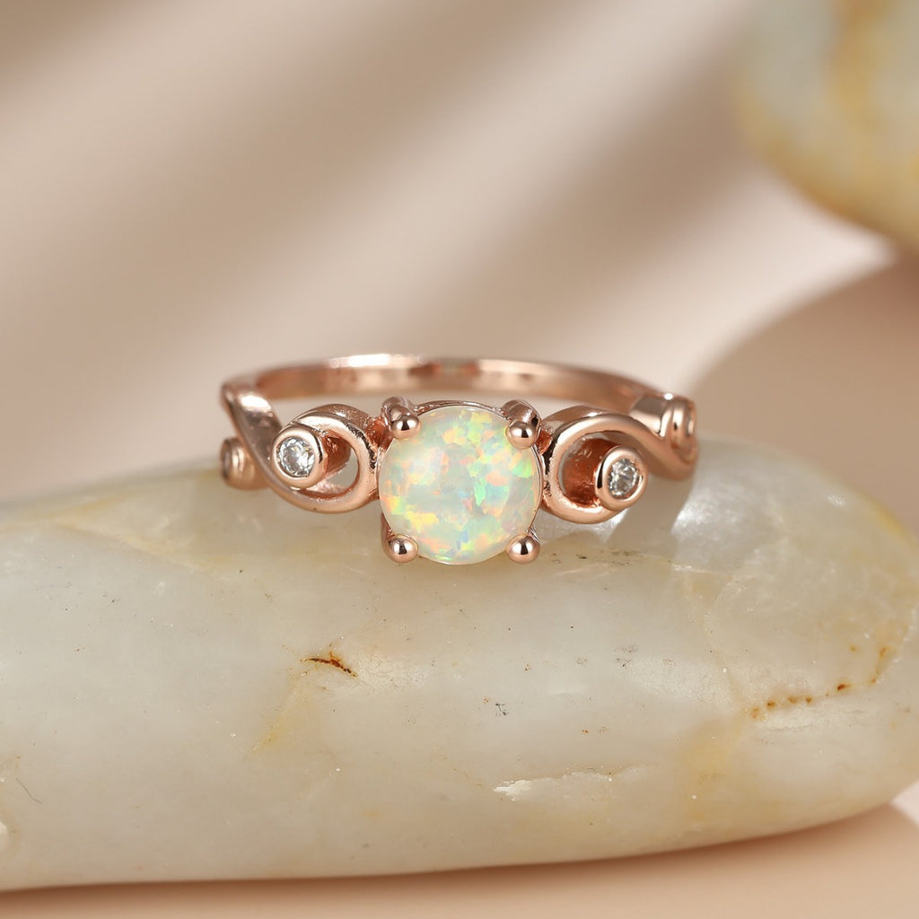 Damen Ring mit funkelndem Opal und eleganten Zirkonia-Akzenten Shop Nory