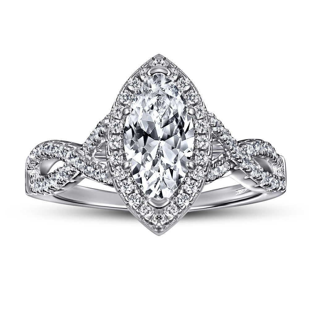 Damen eleganter Verlobungsring mit ovalem Hauptstein und kunstvollem Zirkonia-Besatz Shop Nory