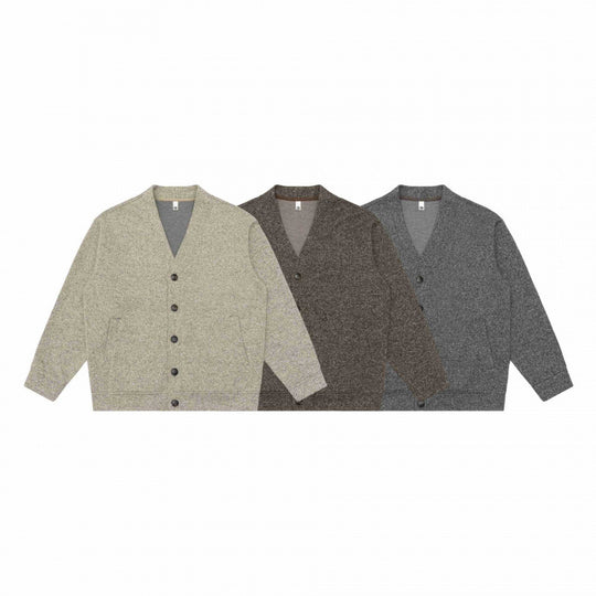 Unisex Oversize-Strickcardigan mit V‑Ausschnitt, durchgehender Knopfleiste und aufgesetzten Eingrifftaschen Shop Nory