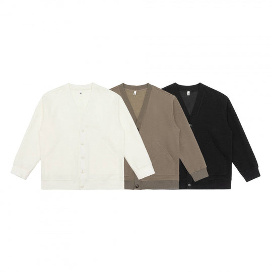 Unisex Oversize Waffelstrick-Cardigan mit V-Ausschnitt, Knopfleiste und aufgesetzten Taschen Shop Nory