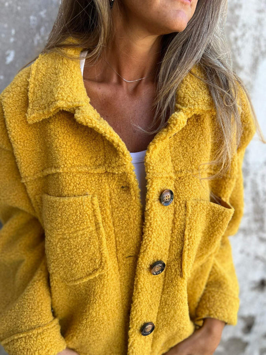 Damen nan kurze Teddyjacke mit Reverskragen, Knopfleiste und aufgesetzten Taschen Shop Nory