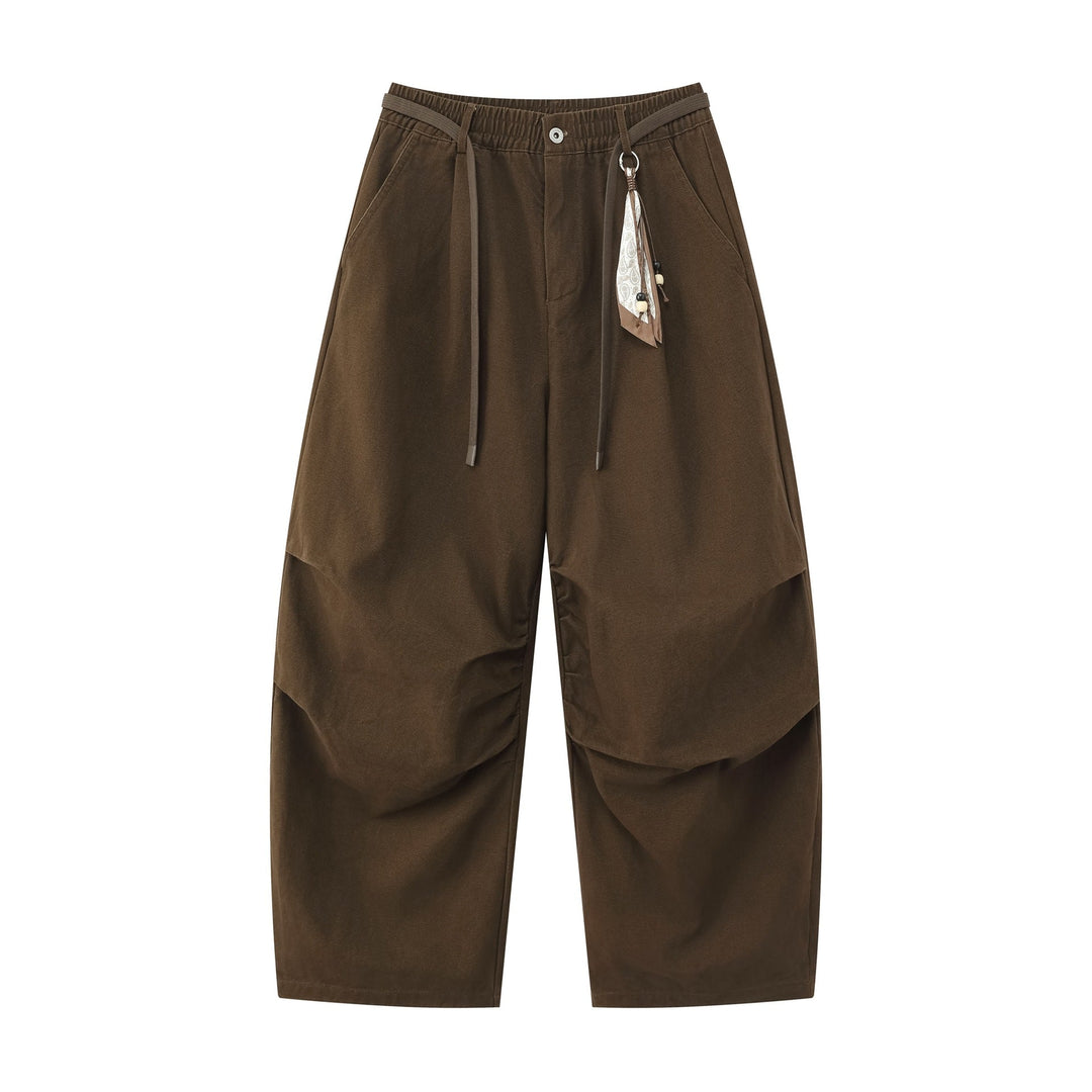 Damen Weite Culotte‑Hose mit Elastikbund, Stufenfalten und dekorativem Tuchanhänger Shop Nory