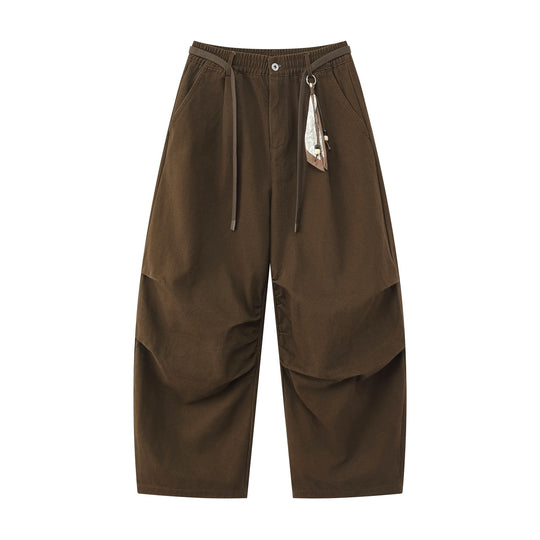 Damen Weite Culotte‑Hose mit Elastikbund, Stufenfalten und dekorativem Tuchanhänger Shop Nory