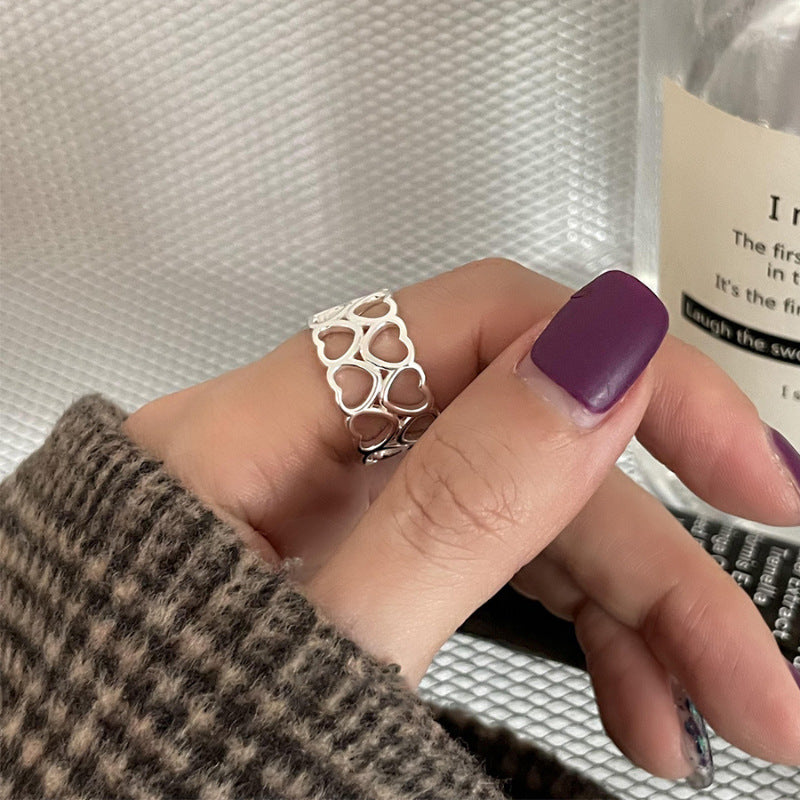 Damenring mit verspieltem Herzdesign und filigranem Drahtwerk Shop Nory