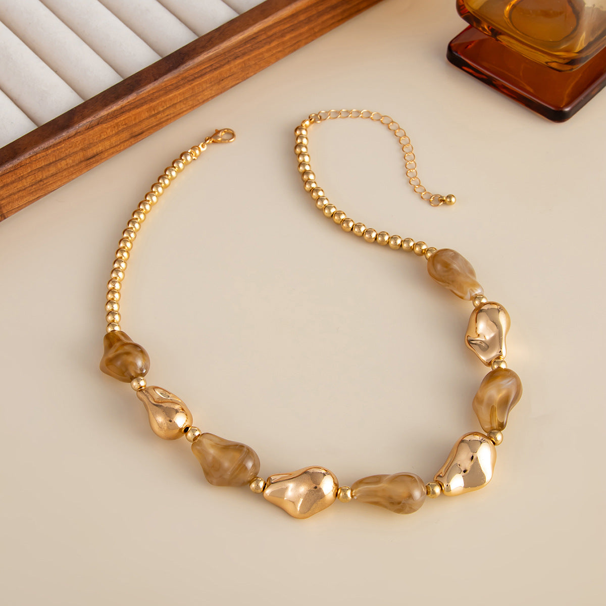 Damen elegante und modische Kette mit goldenen und türkisfarbenen Elementen Shop Nory