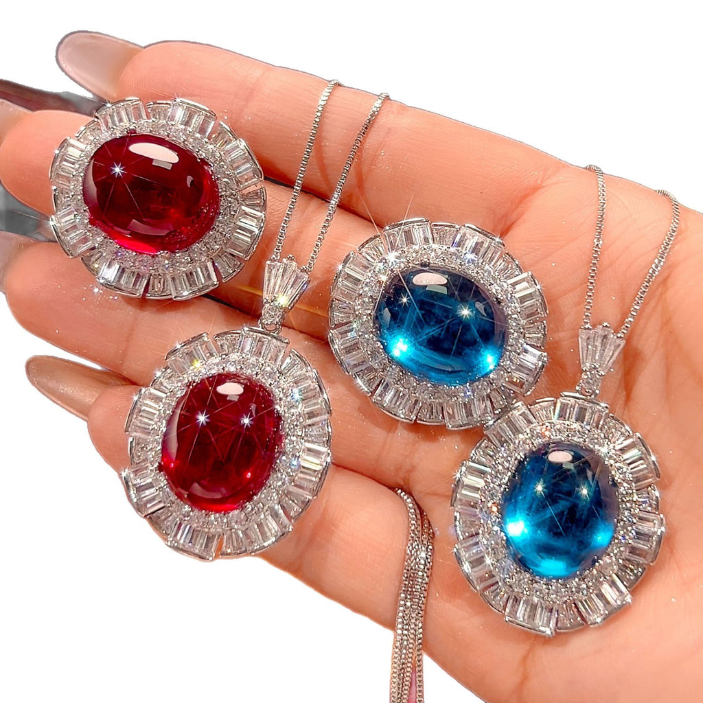 Luxuriöse ovale Cabochon Edelstein Halo Anhänger Halskette mit Baguette und rundem Stein Halo