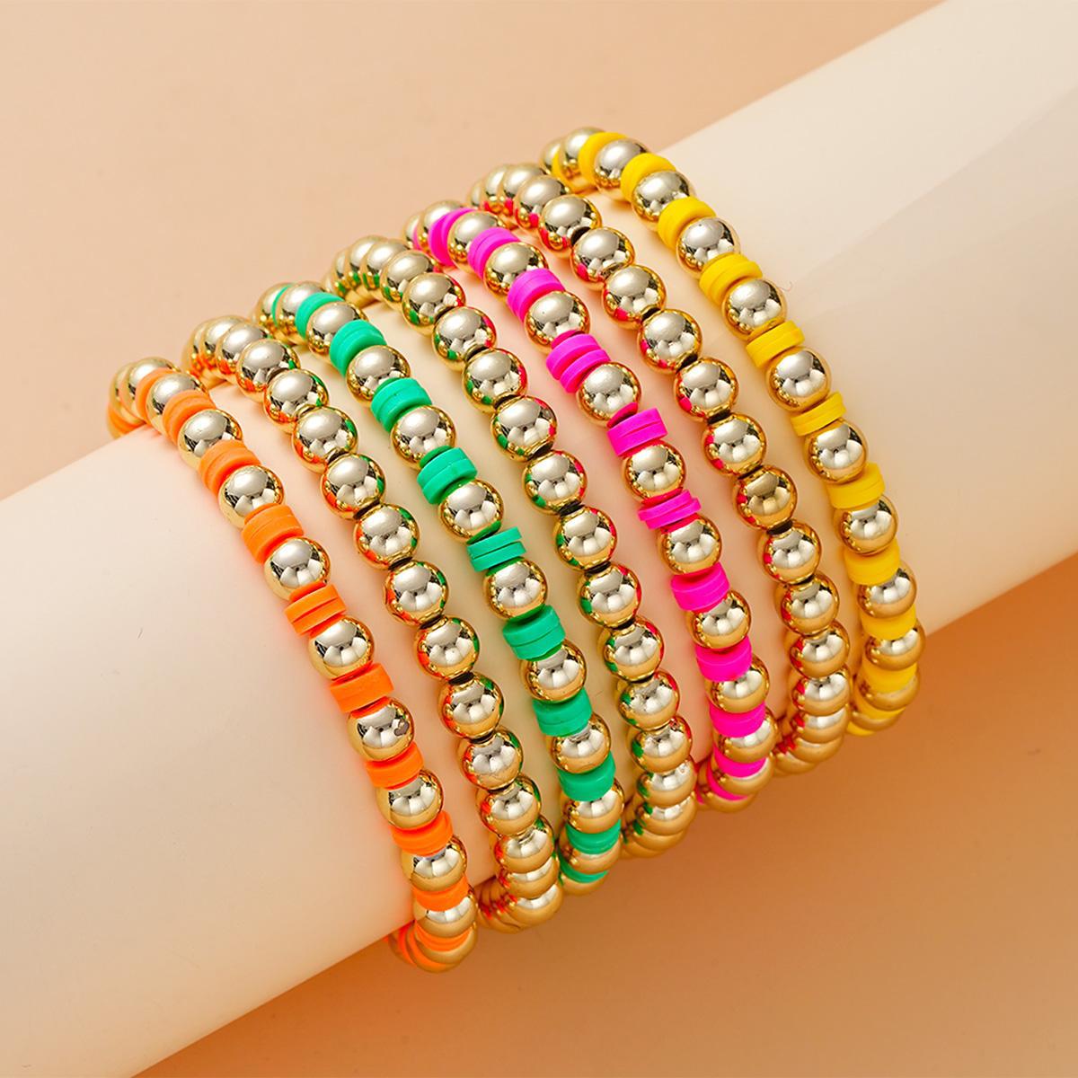 Damen Armband-Set mit bunten Perlen und glänzenden Metallakzenten Shop Nory