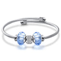 Damen Armband mit funkelnden Zirkonia und eleganten Glasdesign Shop Nory