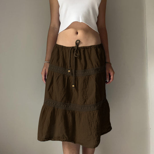 Damen nan gestufter Boho-Midirock mit elastischem Kordelbund und Häkelband-Details Shop Nory