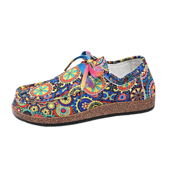 Damen Bequeme Plateau-Slipper im Ethno‑Print mit Korkoptik‑Sohle Shop Nory