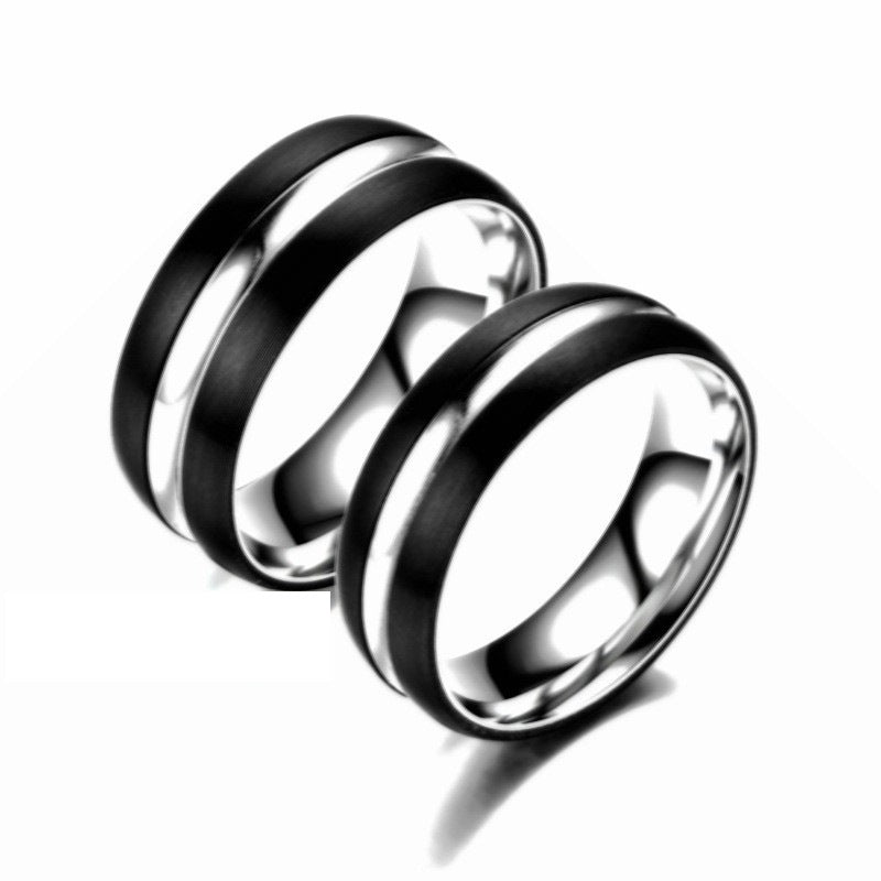 Herren Ring mit elegantem schwarzem Finish und polierten Edelstahlakzenten Shop Nory