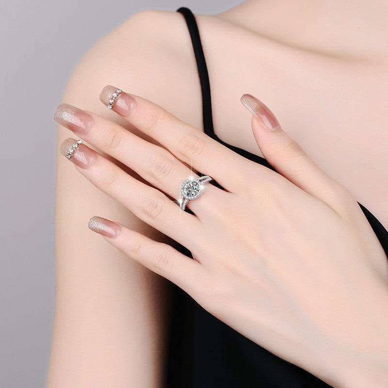 Damen eleganter Verlobungsring mit funkelndem Zirkonia und kunstvoller Fassung Shop Nory