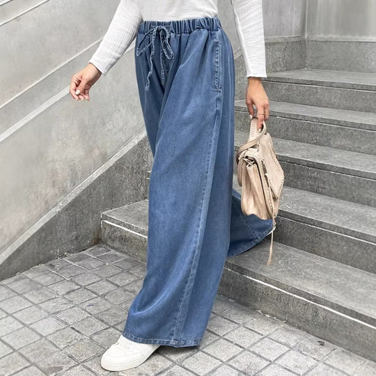 Damen Relaxte Palazzohose aus Denim mit Tunnelzugbund, Eingrifftaschen und extra weitem Bein Shop Nory