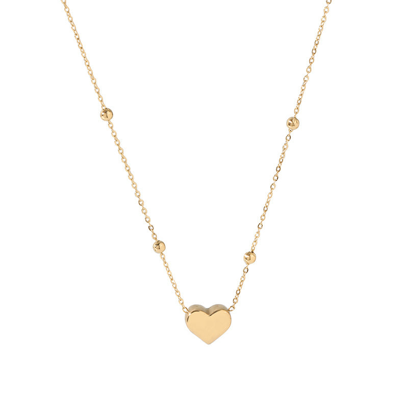 Damen zarte Halskette mit Herzanhänger und goldenen Akzenten Shop Nory