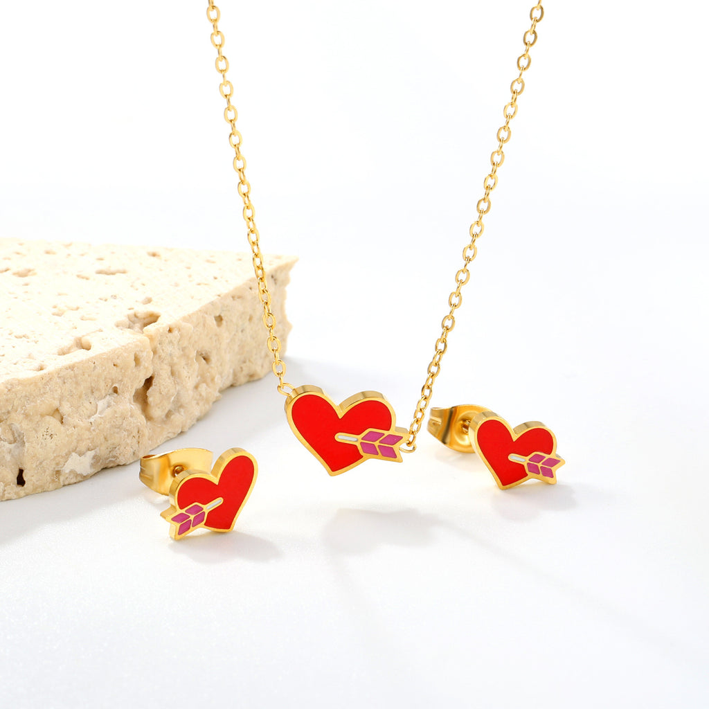 Damen Schmuckset mit rotem Herzanhänger und passenden Ohrsteckern Shop Nory