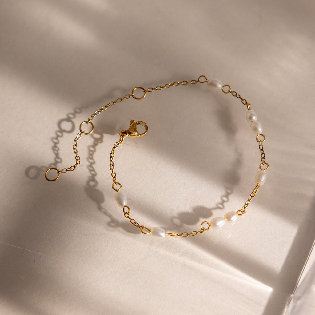 Damen Edelstahlarmband mit elegantem Perlendesign Shop Nory