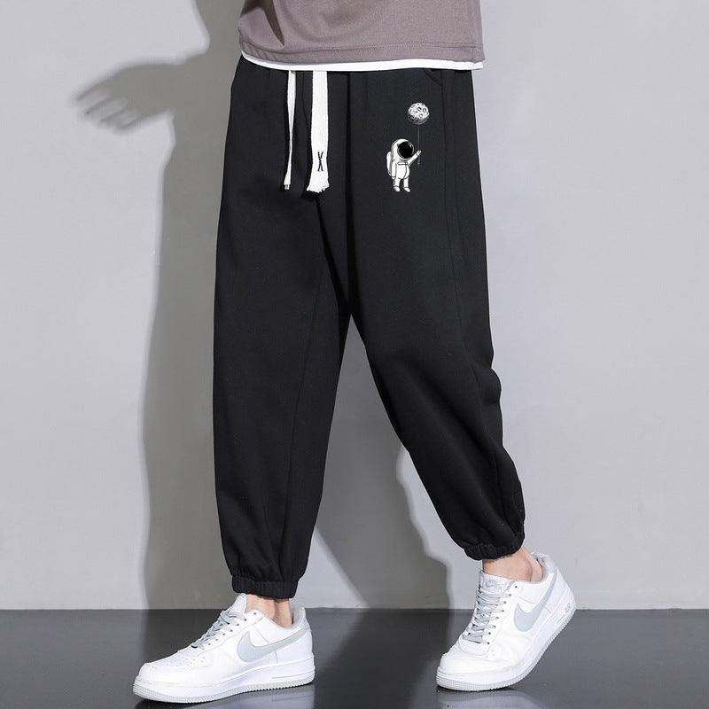 Herren Lockere Jogginghose mit Astronauten-Print, Kordelzugbund und elastischen Saumbündchen Shop Nory