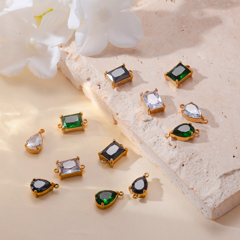 Damen Schmuckanhänger mit tropfenförmigem Kristall und elegantem Goldrahmen Shop Nory