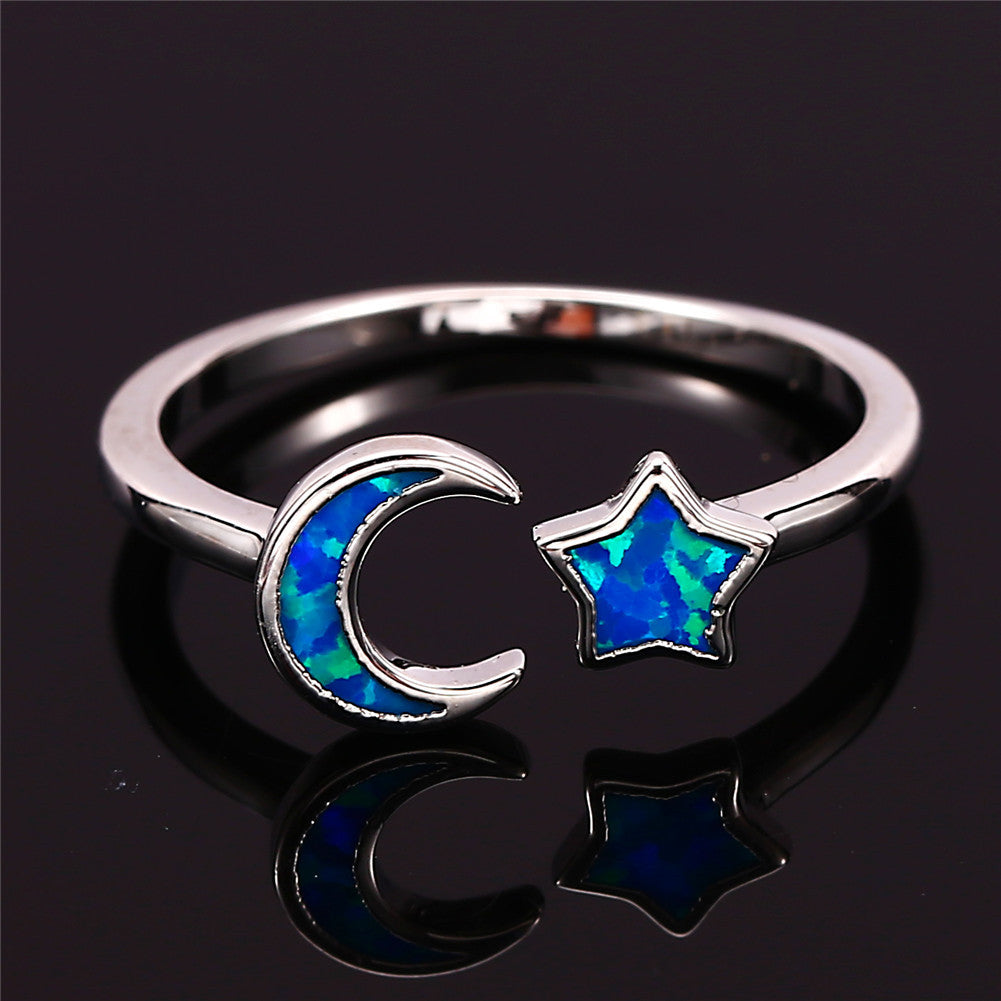 Damen Ring mit kunstvollem Mond- und Sternmotiv aus schimmerndem Opal Shop Nory