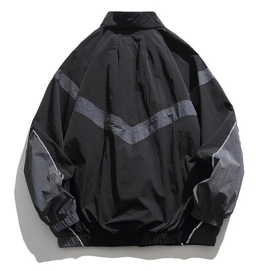 [Unisex] Oversize technische Wind- und Regenjacke mit Stehkragen, reflektierenden Paspeln und elastischem Saum Shop Nory