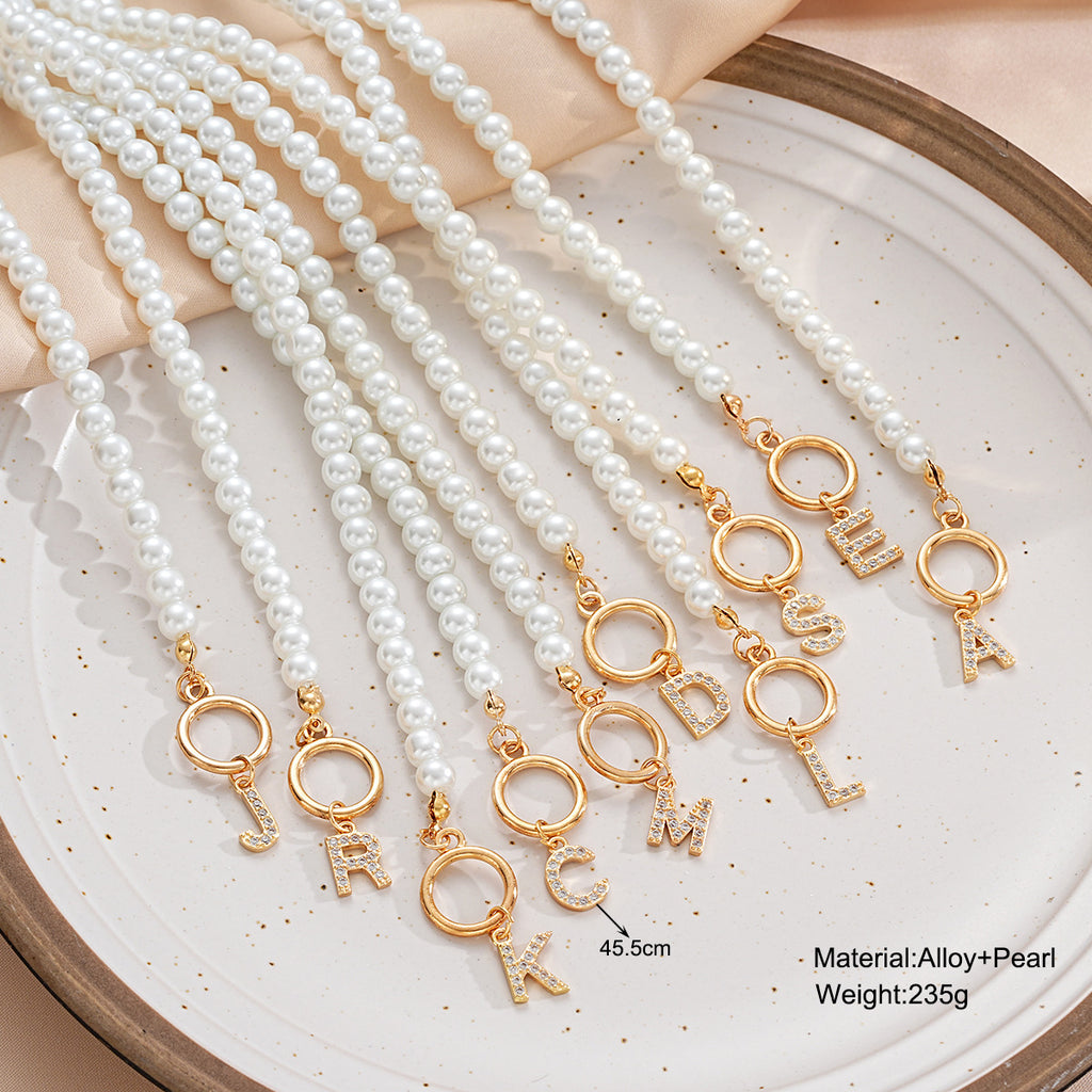 Damen Halskette mit auffälligem Perlen-Design und personalisiertem Anhänger Shop Nory