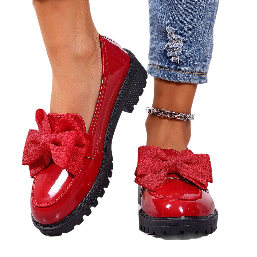 Damen Plateau-Loafer aus Lackimitat mit profilierter Gummisohle und Zierschleife Shop Nory