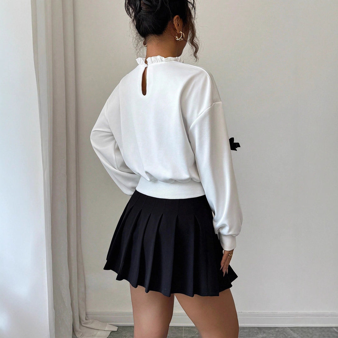 Damen Cropped Sweatshirt mit Rüschenkragen, Ballonärmeln und Zier‑Schleifen Shop Nory