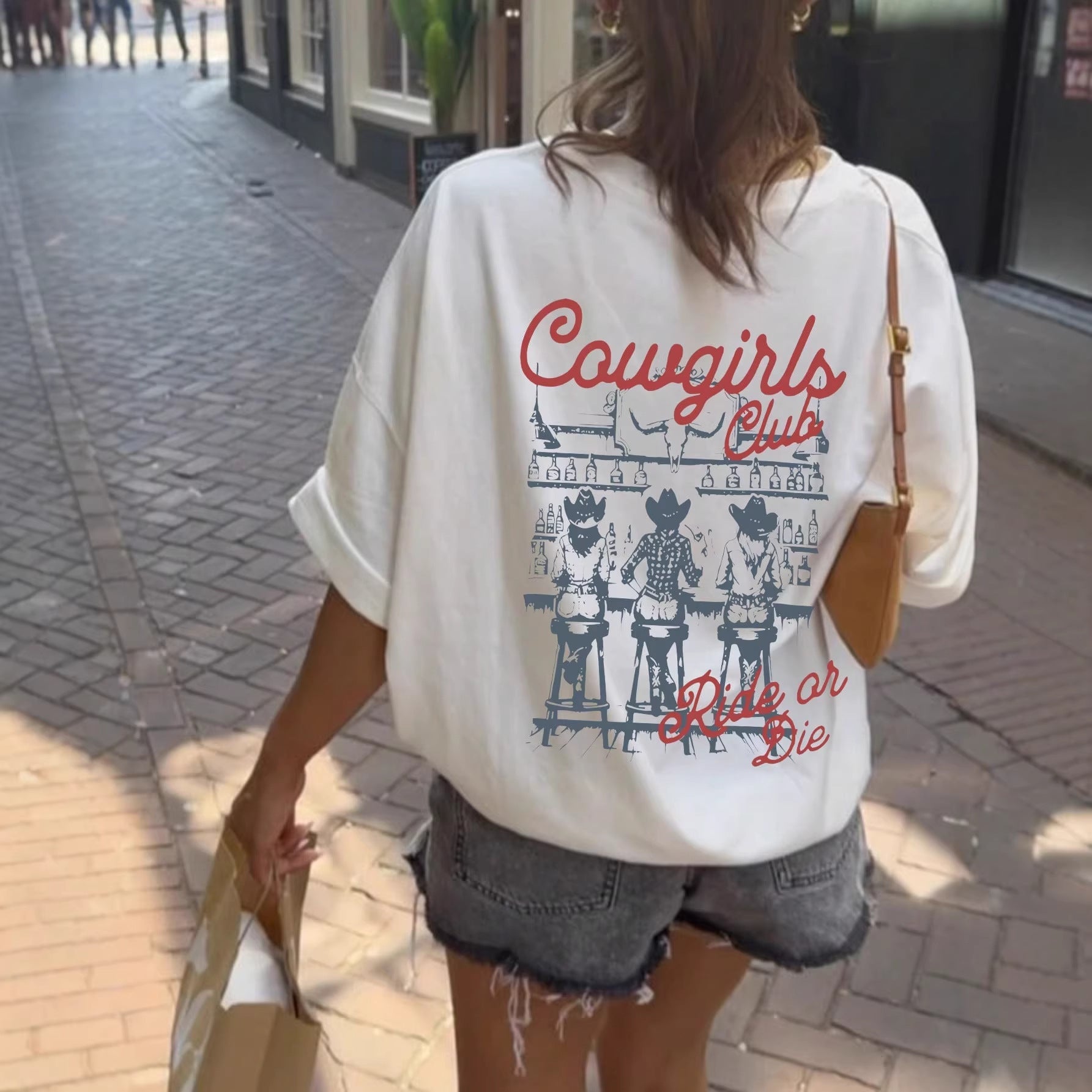 Damen Oversize T-Shirt mit Retro Cowgirl-Motiv Shopnory
