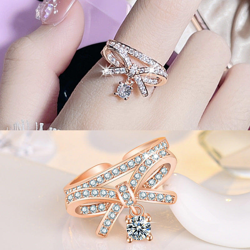 Damen Offener Ring mit kunstvollem Schleifen-Design und funkelndem Zirkonia Shop Nory
