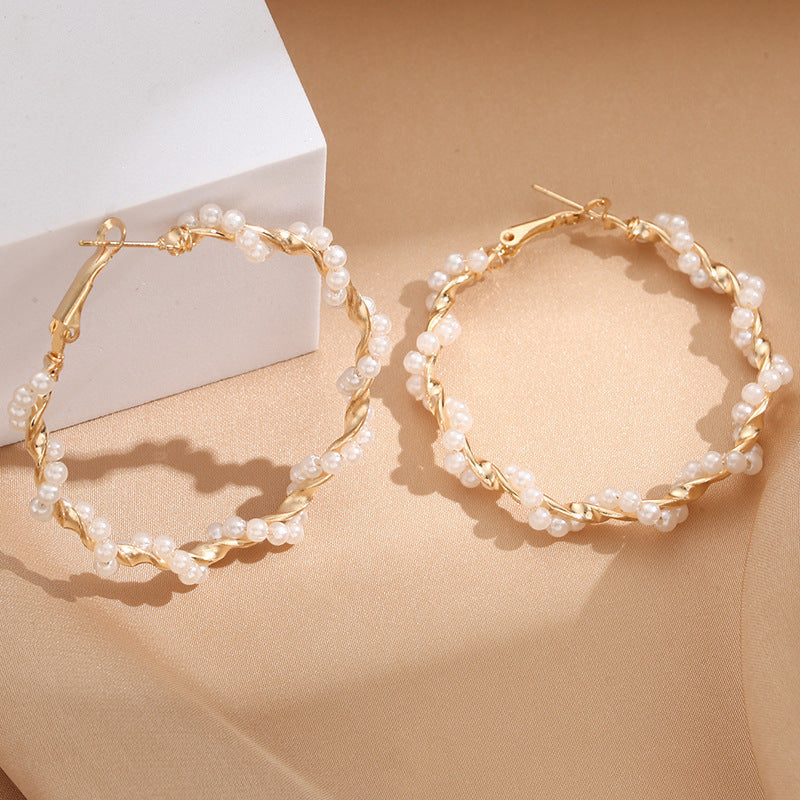 Damen Creolen mit luxuriösen Perlenakzenten und elegantem, gedrehtem Design Shop Nory