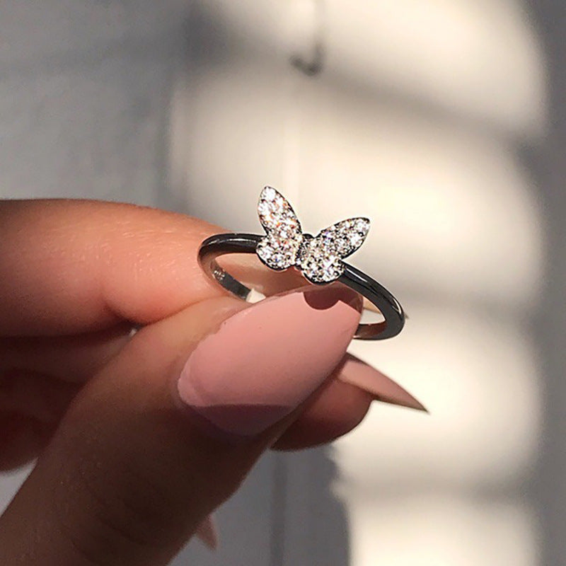Damenring mit filigranem Schmetterlingsdesign und funkelnden Zirkonia Shop Nory