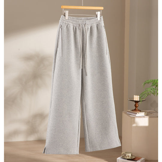 Damen weite French‑Terry Lounge-Sweatpant mit hohem Bund, Kordelzug und seitlichen Schlitzen Shop Nory